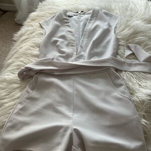 Sleeveless low cut White Romper